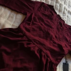 Burgundy flowing dress.